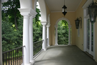 Veranda with bowed and straight ballustrads